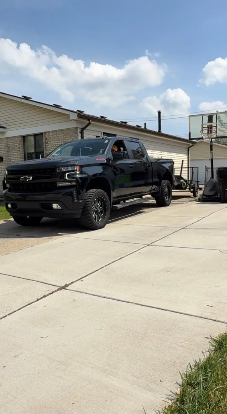 Demohaulic truck and trailer used for junk removal and hauling in Metro Detroit