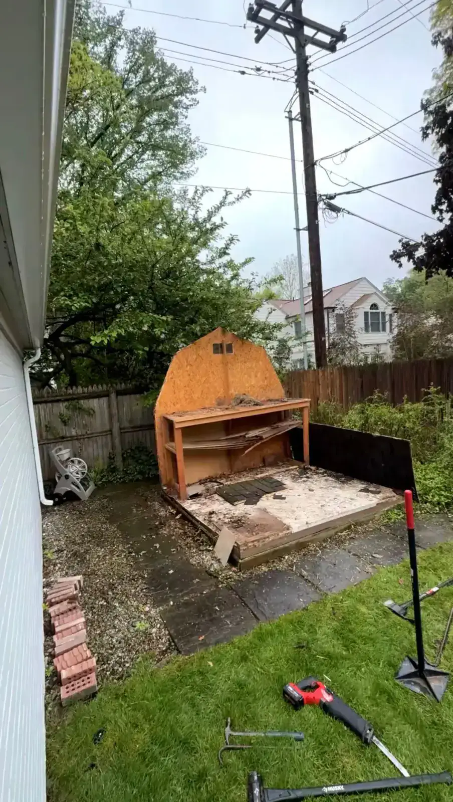 Wood storage shed demolition in progress in Grosse Pointe Farms MI
