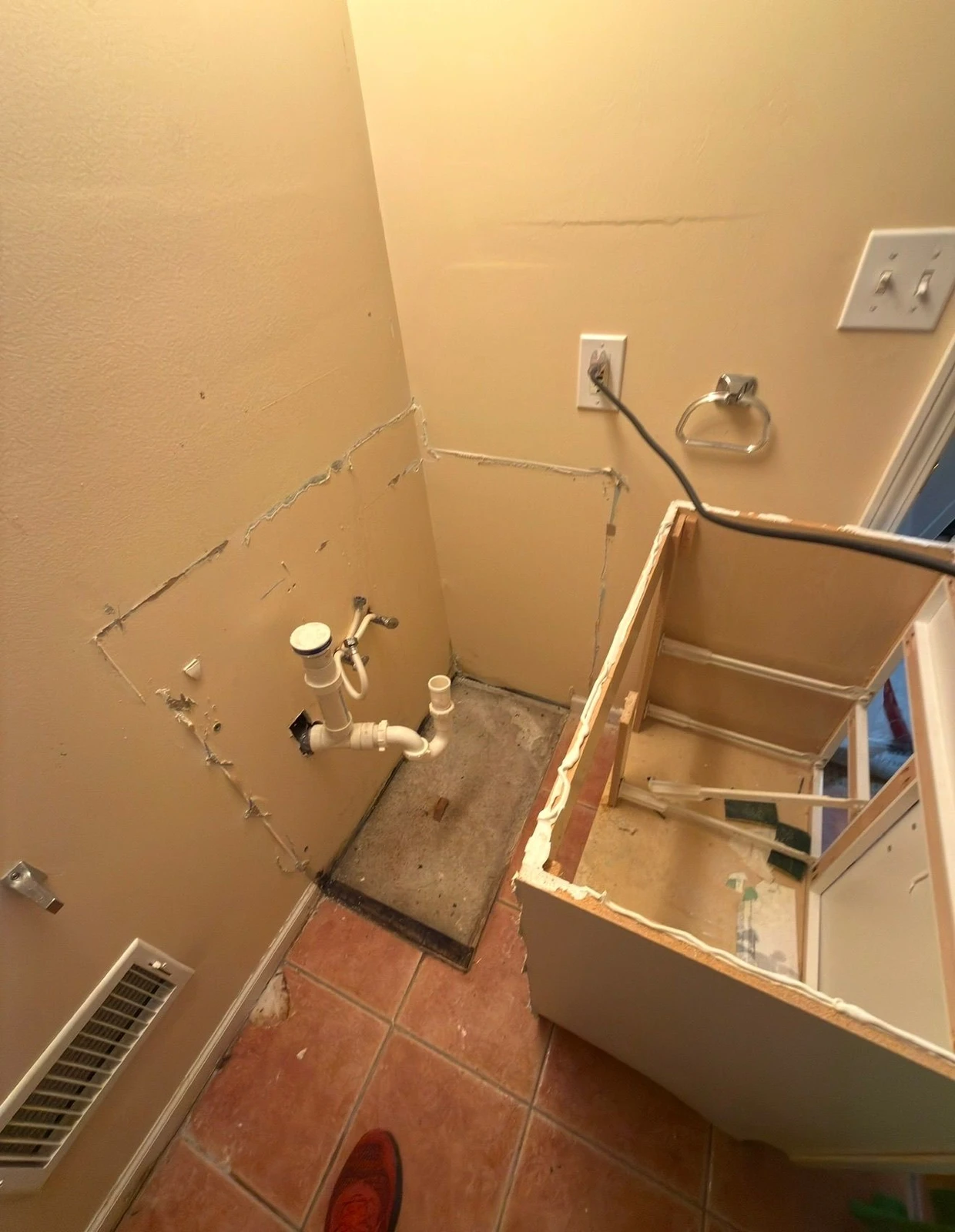 Demohaulic crew completing basement bathroom demolition