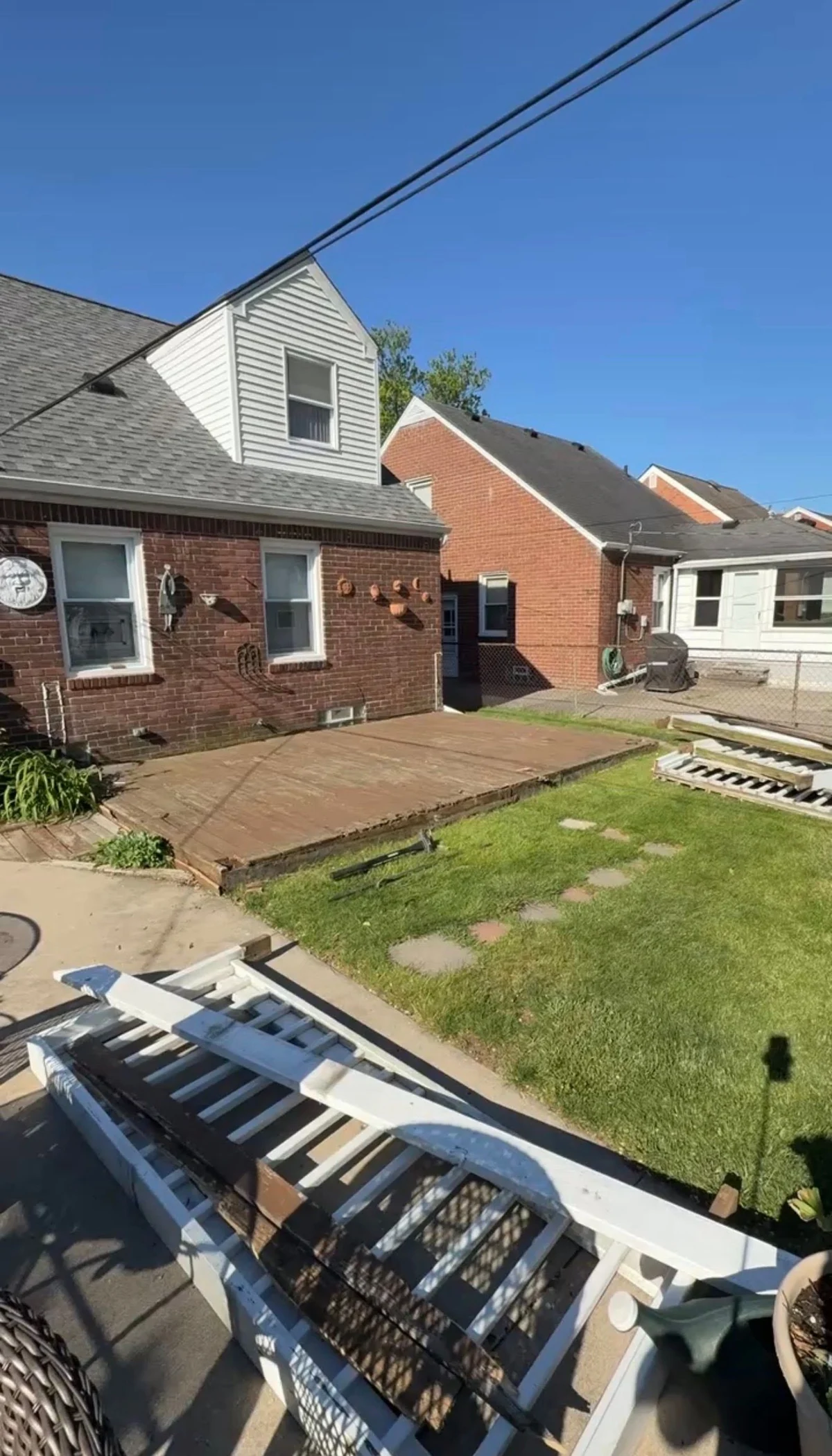 Existing wood deck boards before removal in Grosse Pointe Woods, Michigan