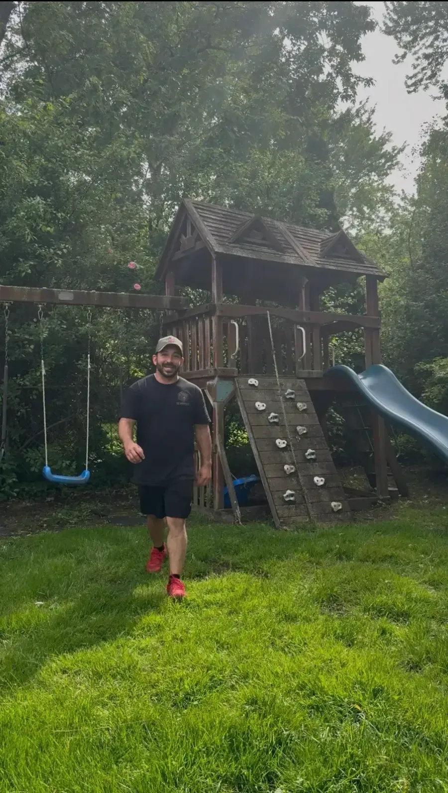 Large wooden backyard playset before demolition in Grosse Pointe Woods Michigan