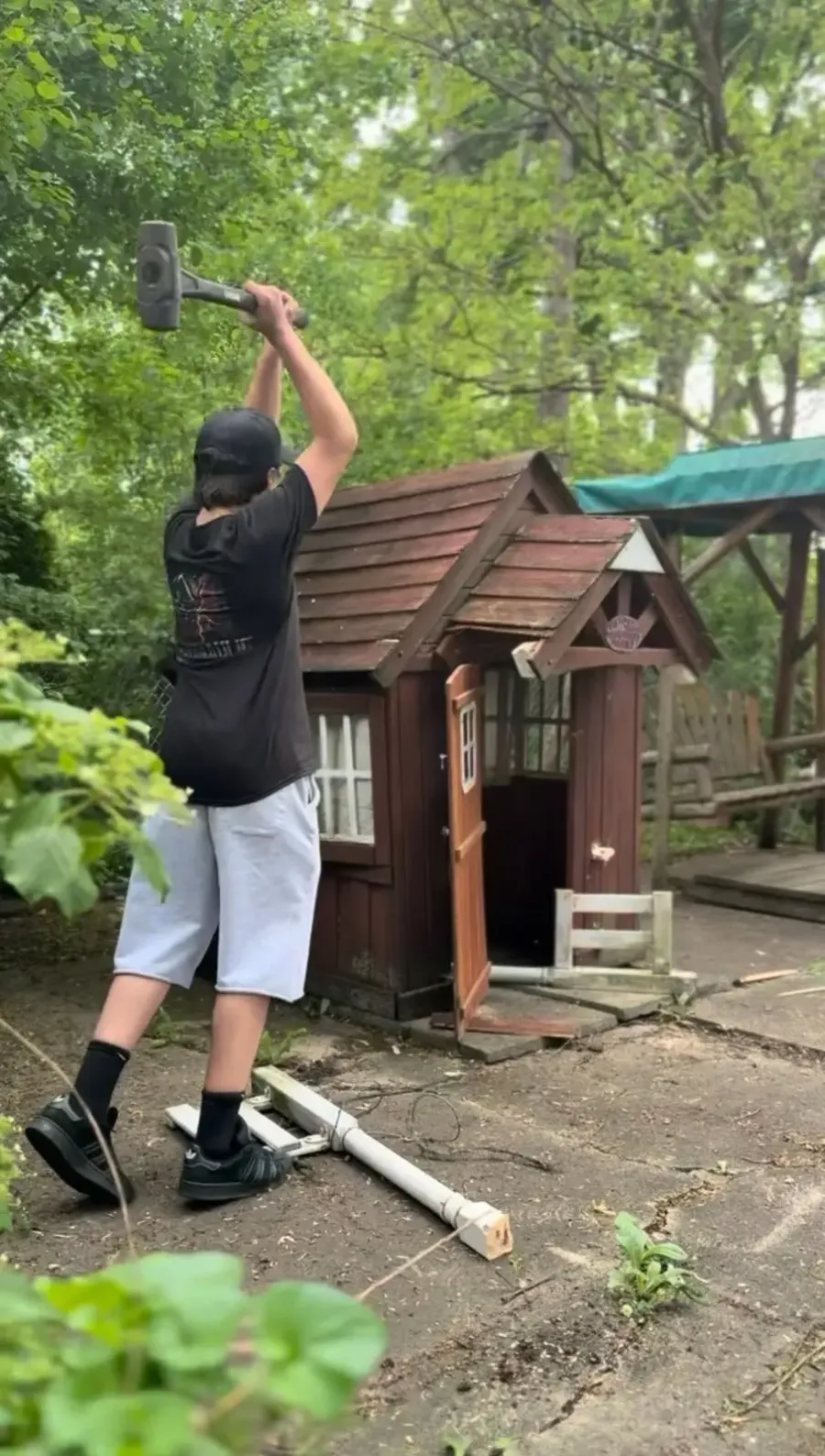 Children's wooden playhouse demolition in progress in Grosse Pointe Woods MI