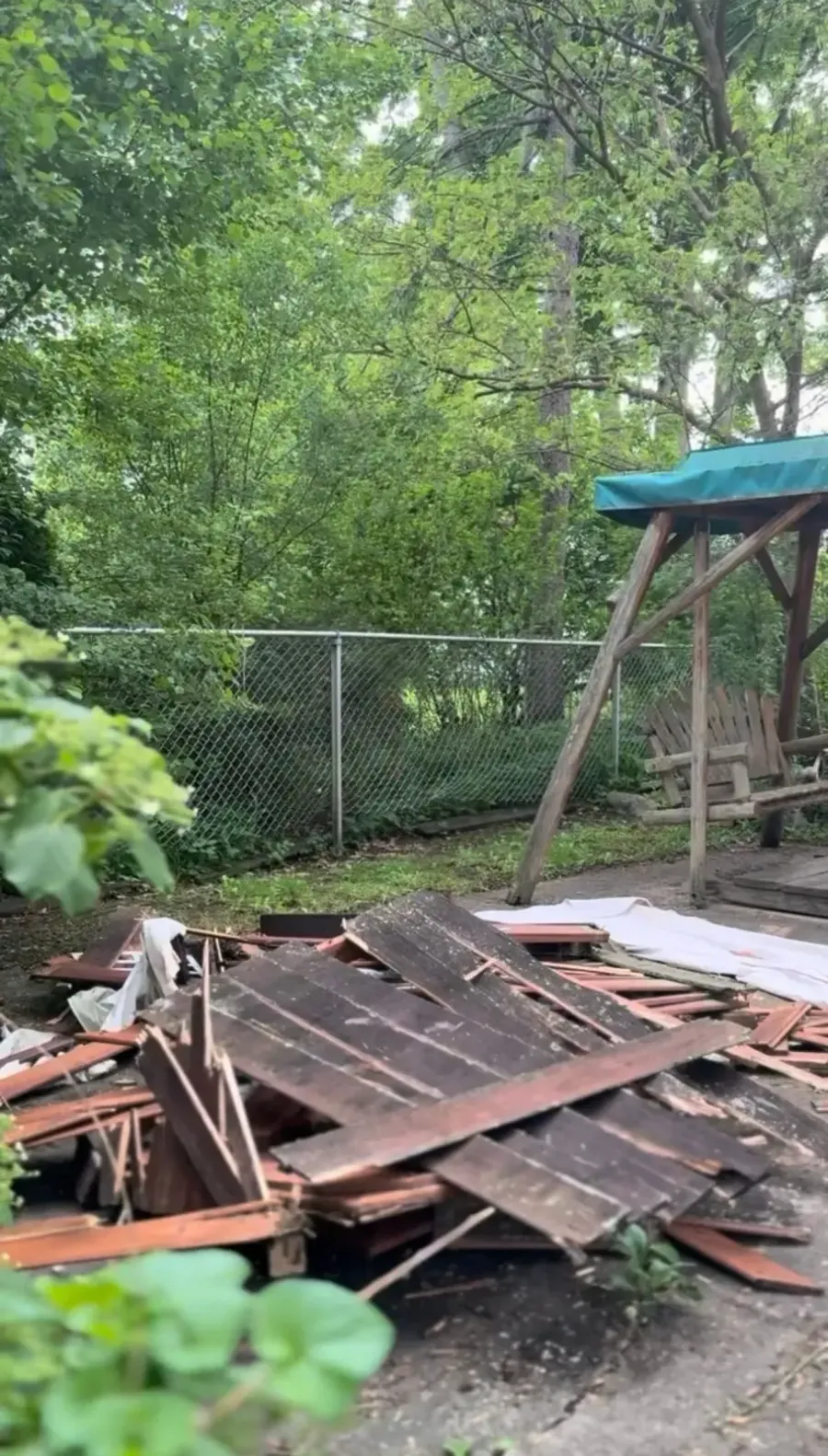 Dismantled playhouse debris staged for haul away in Grosse Pointe Woods Michigan