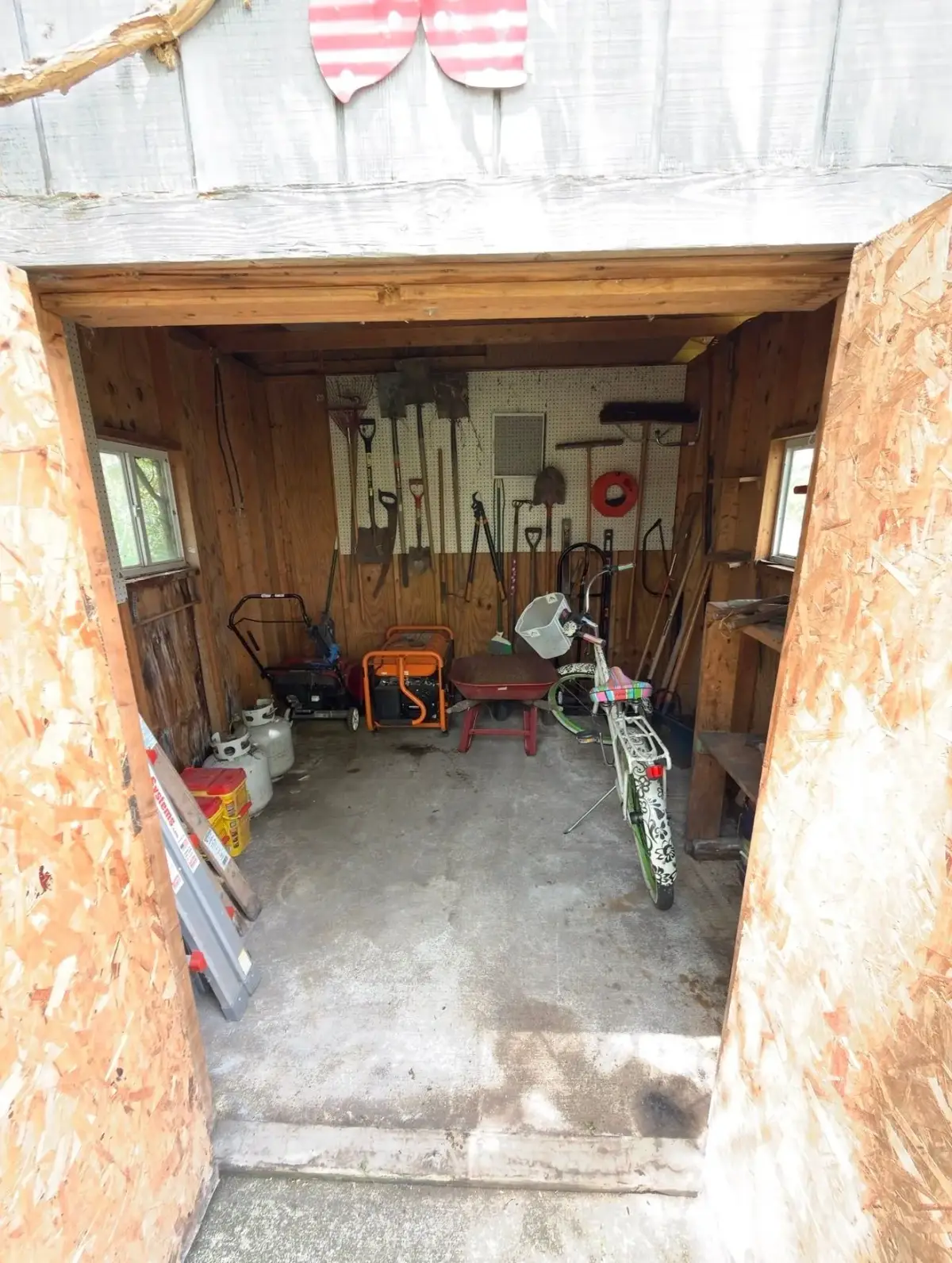 Shed interior after cleanout and reorganization in Grosse Pointe Woods MI