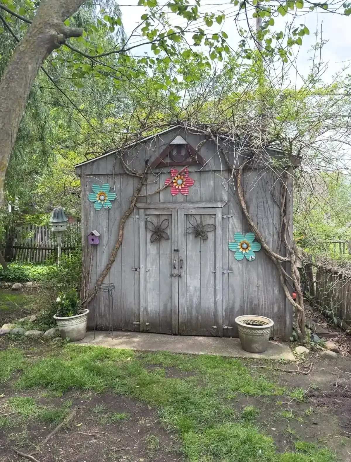 Customer's shed with decorative pieces mounted after playhouse demolition in Grosse Pointe Woods Michigan