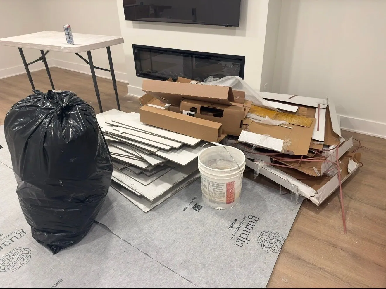 Construction debris from a tile installation accumulated inside a home in Royal Oak Michigan